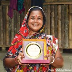 Shil with her award for 'Best Fish Farmer'